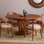 Rounded dining table with 4 chairs